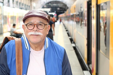 Senior man using a train