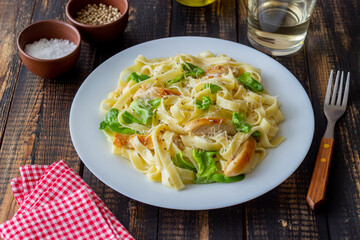 Italian fetuccini alfredo pasta with chicken. National cuisine. Healthy eating.