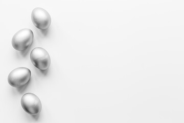 Silver eggs isolated on white background. Easter decoration background. Top view