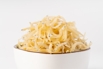 Dried spaghetti fish on pure white background