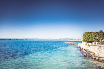 Fototapeta premium Ortigia, Syracuse / Italy:, December 2018: Panoramic view of the ancient Ortigia island, Syracuse, Sicily. Italy
