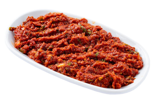 spicy paste isolated on white background. Harissa. Local name acılı ezme meze