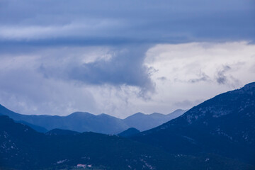 Spring sunset in Santuari Mare De Deu Del Mont peak, La Garrotxa, Spain