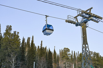 Chairlift for skiers on a rope