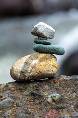 Fototapeta na wymiar Balance of stones, natural art, yoga for the soul 