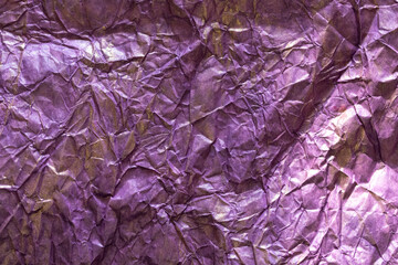 paper background of purple and gold color.