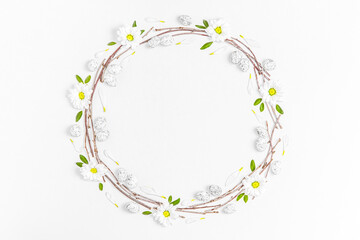 Fototapeta premium Creative layout composition of flowers and easter eggs on pastel background.