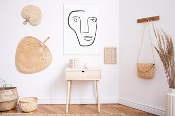 Stylish korean interior of living room with mock up poster frame, elegant accessories, dried flowers in vase, wooden shelf and hanging rattan leaf, bags. Minimalistic concept of home decor. Template. 