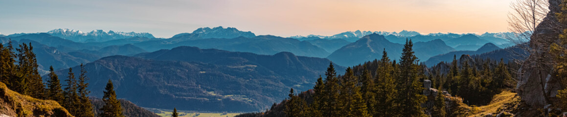 High resolution stitched panorama of a beautiful alpine autumn or indian summer view with the austrian alps in the background at the famous Kampenwand summit, Aschau, Chiemgau, Bavaria, Germany