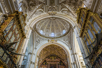 Obraz premium Inside the moorish Cordoba Mezquita Catedral, an impressive gothic and baroque cathedral, built on a mosque in Andalusia, Spain