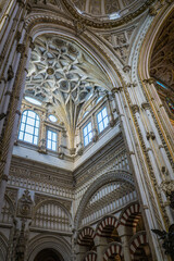 Obraz premium Inside the moorish Cordoba Mezquita Catedral, an impressive gothic and baroque cathedral, built on a mosque in Andalusia, Spain