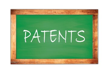 PATENTS text written on green school board.