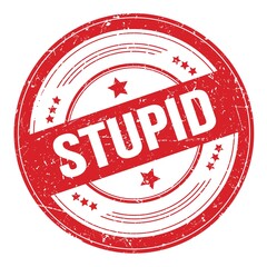 STUPID text on red round grungy stamp.