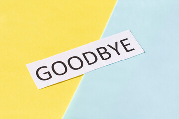 word goodbye on a colored background.