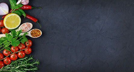 Obraz na płótnie Canvas Colorful various herbs and spices for cooking on dark background, copy space, mock up, banner