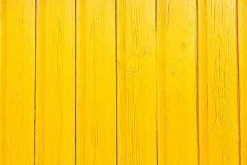 Obraz premium background of wooden boards painted with yellow paint