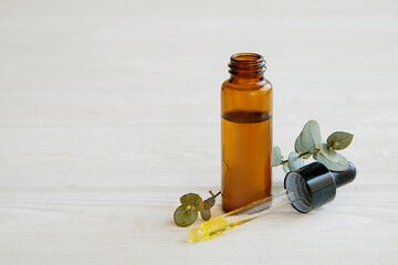 Brown transparent bottle with 100% pure hyaluronic acid serum for skin vaccination and dropping on...