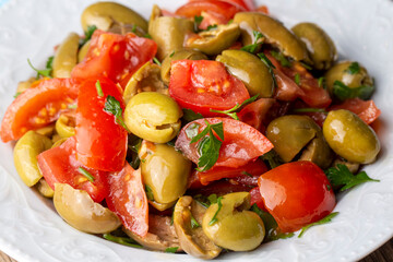 Gourmet flavors from traditional Turkish cuisine; green olive salad (Turkish name; Kirma yesil...