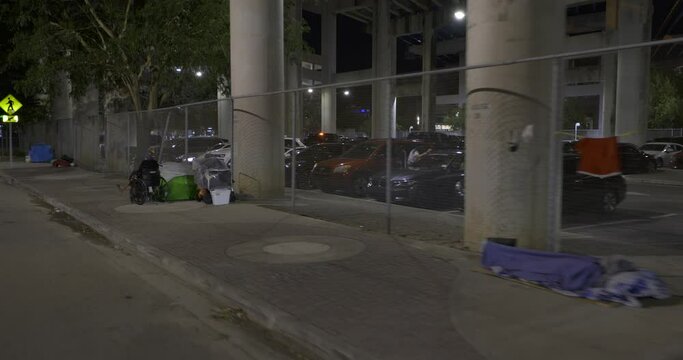 Homeless people living on the streets in Miami at night