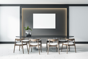 White screen with copyspace in the center of dark wall panel with lights around and big table with modern wooden chairs on ceramic floor tiles. Mockup