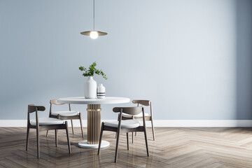 Stylish dining room interior design with modern white table, wooden chairs around a parquet