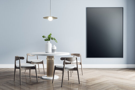 Blank black poster on light wall in dining room with modern white furniture with golden details and wooden parquet. Mock up