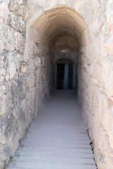 Fototapeta na wymiar Exit from the underground system of tunnels in ruins of the palace of King Herod - Herodion in the Judean Desert, in Israel