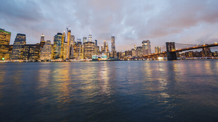 Fototapeta na wymiar Beautiful Brooklyn Bridge on the background of the night New York cityscape