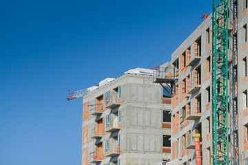 Construction site. A flat apartments building. Industrial view.