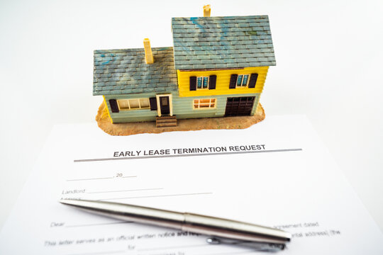 Early Lease Termination Request Letter With Pen And Model House.