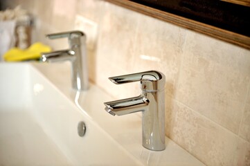 water tap in a bath room, shallow DOF