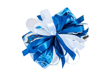 The blue gift box is decorated with a ribbon bow and stands isolated on a white background. Top view