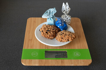 THE KITCHEN SCALES WITH COOKIES AND CANDIES