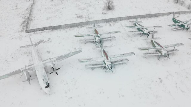Aeiral view of a formation of An-2 and An-24RT abandoned airplanes