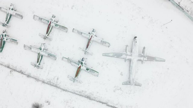 Aeiral view of a formation of An-2 and An-24RT abandoned airplanes