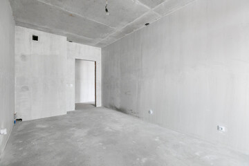 interior of the apartment without decoration in gray colors. rough finish