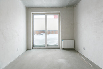 interior of the apartment without decoration in gray colors. rough finish
