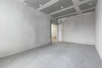interior of the apartment without decoration in gray colors. rough finish