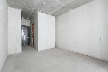 interior of the apartment without decoration in gray colors. rough finish