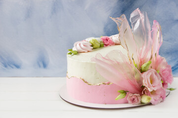 Modern pink cake with fresh roses and decorated with rice paper Concept for Wedding , St. Valentine's Day, Mother's Day, Birthday Cake.