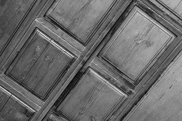 decoration of metal doors with forged elements, and wood