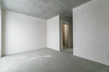 interior of the apartment without decoration in gray colors. rough finish