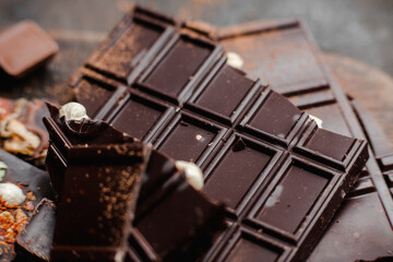 Chocolate bars of different varieties close up