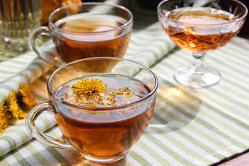 Cup of healthy dandelion tea with honey. Vitamin drink. Herbal medicine. Copy space.