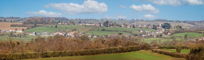 Fototapeta na wymiar Panoramic view towards Buckland Dinham in Somerset, UK from the East Mendip Way footpath