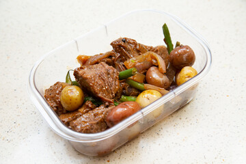 To go lunch box with organic meal preparation.