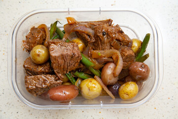 To go lunch box with organic meal preparation.