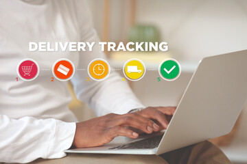 African-American man with laptop using delivery service application