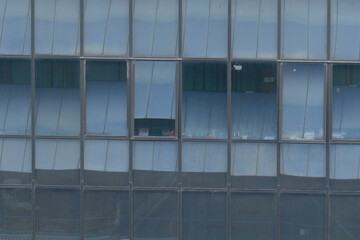 Close up view of an abstract building with window glass