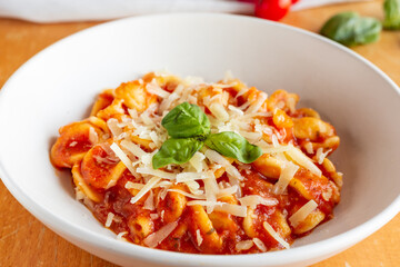 Orecchiette pasta with tomato sauce, parmesean and basil